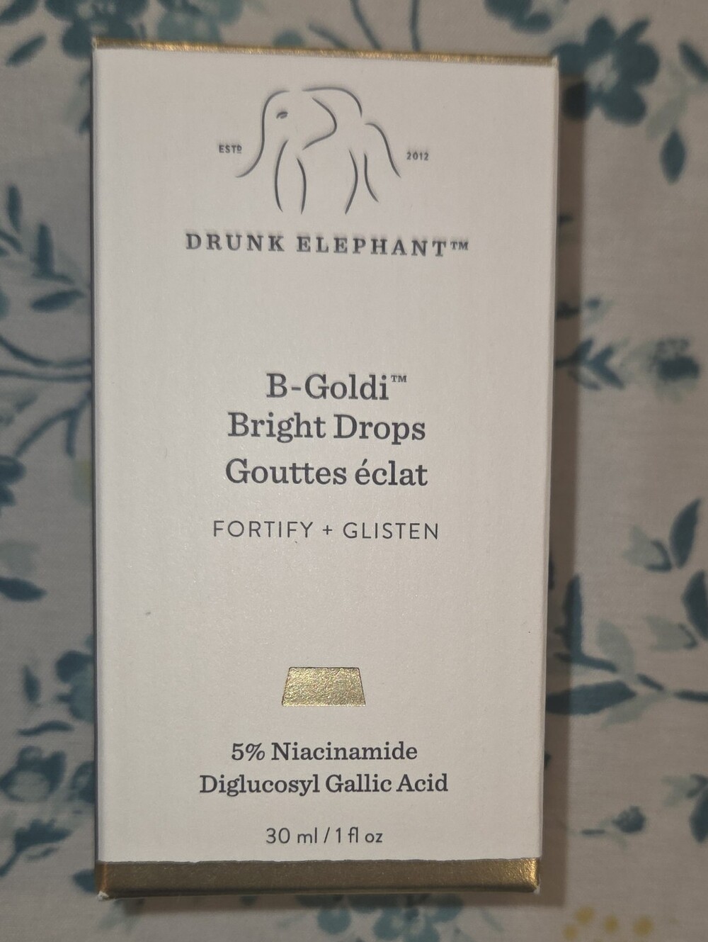 Drunk Elephant B-Goldi Bright Drops — White & Gold Accents